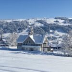 Select Green Hotels Alpenloge im Allgäu covered in snow