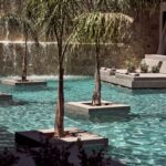 Select Green Hotels Contessina Hotel Pool mit Palmen
