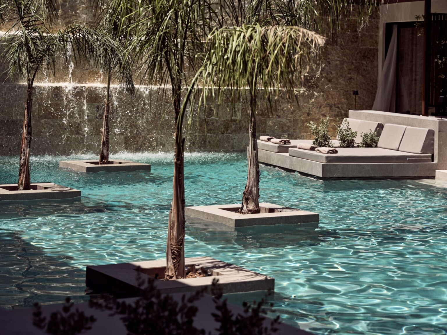 Select Green Hotels Contessina Hotel Pool mit Palmen