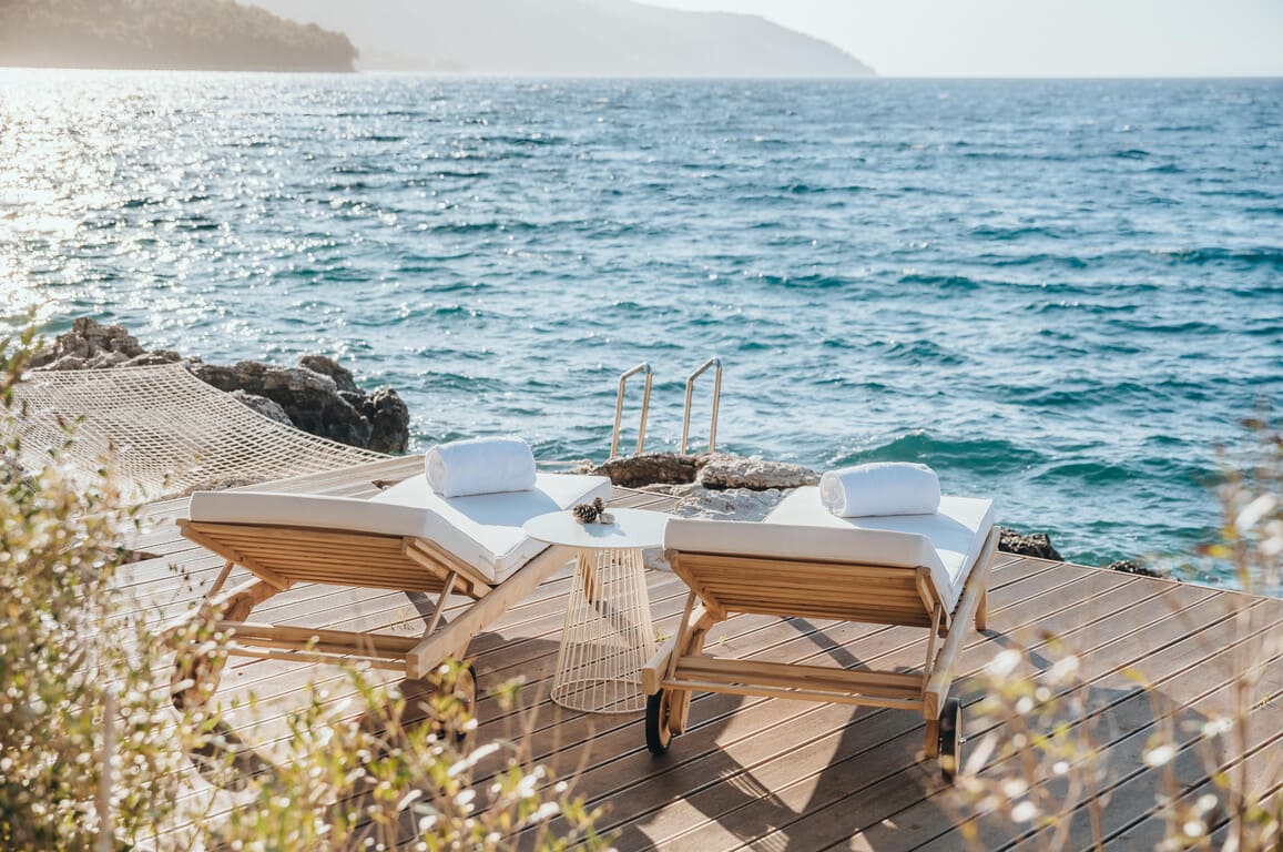 Select Green Hotels Maslina Resort Hvar deckchairs at the beach