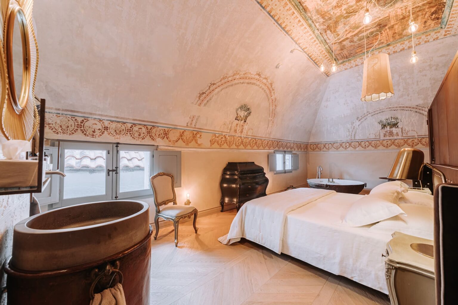 Select Green Hotels Paragon 700 Boutique Hotel & Spa room with antique ceilings